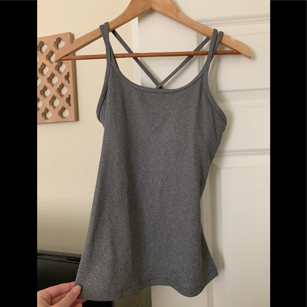 NEVER BEEN WORN! Criss/cross back sports tank top!
